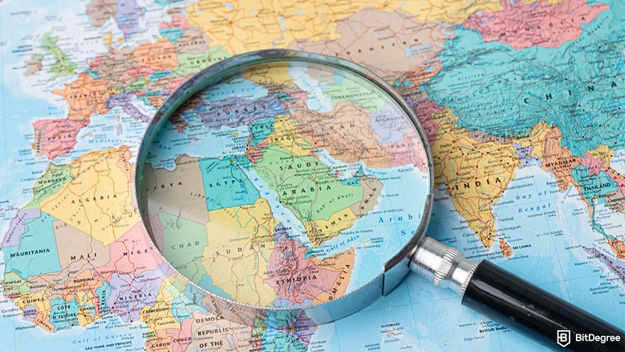Best no-KYC crypto exchange: magnifying glass on the world map. Best no-KYC crypto exchange: magnifying glass on the world map.