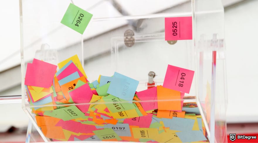 Best online raffle sites: a lottery box with raffle tickets in it.