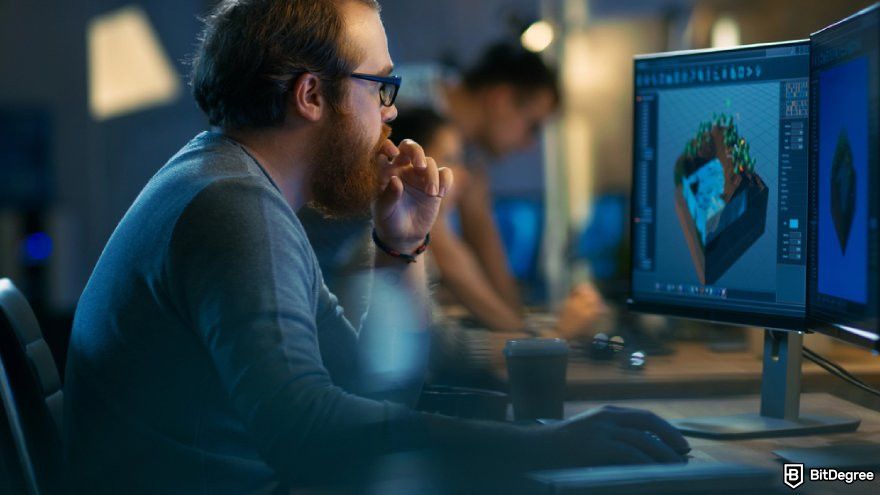 Best programming courses for beginners: a person designing a video game asset on a computer.