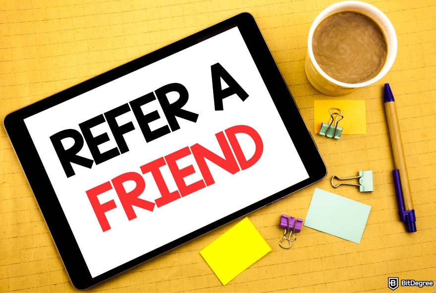 Best referral programs: an iPad with the words Refer a Friend on the screen.