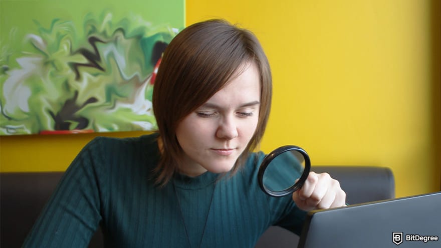 Best Solana airdrops: woman doing some research on the project.