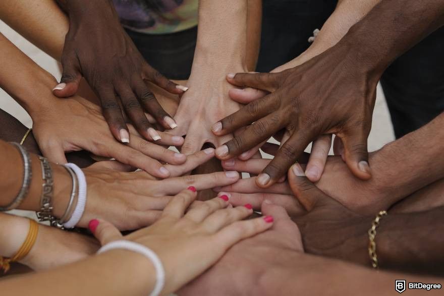 Best Solana presales: people stacking hands.