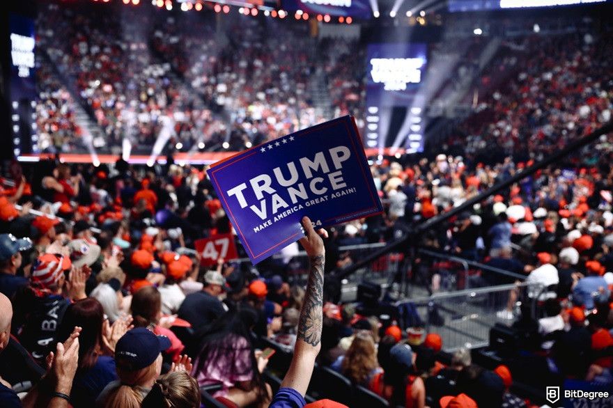 Best Trump meme coins: a Trump supporter holding a poster.