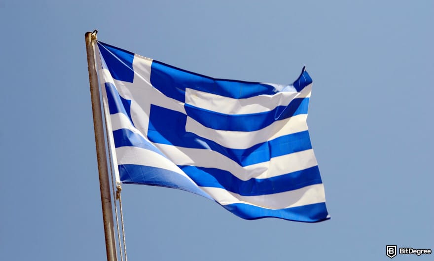 Best way to send money to Greece: Greek flag over blue sky.