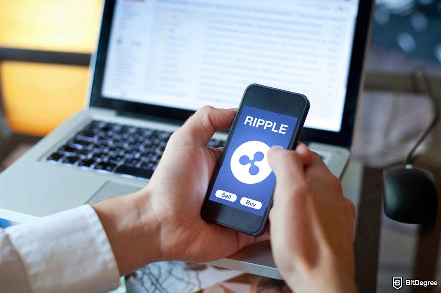 Best XRP meme coins: Ripple's logo on a mobile device.