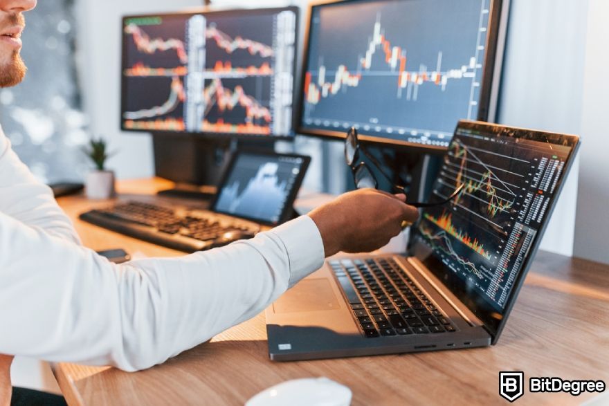 Binance margin trading: a trader analyzing charts.