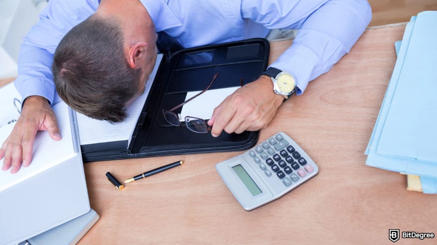 Binance taxes: exhausted man.