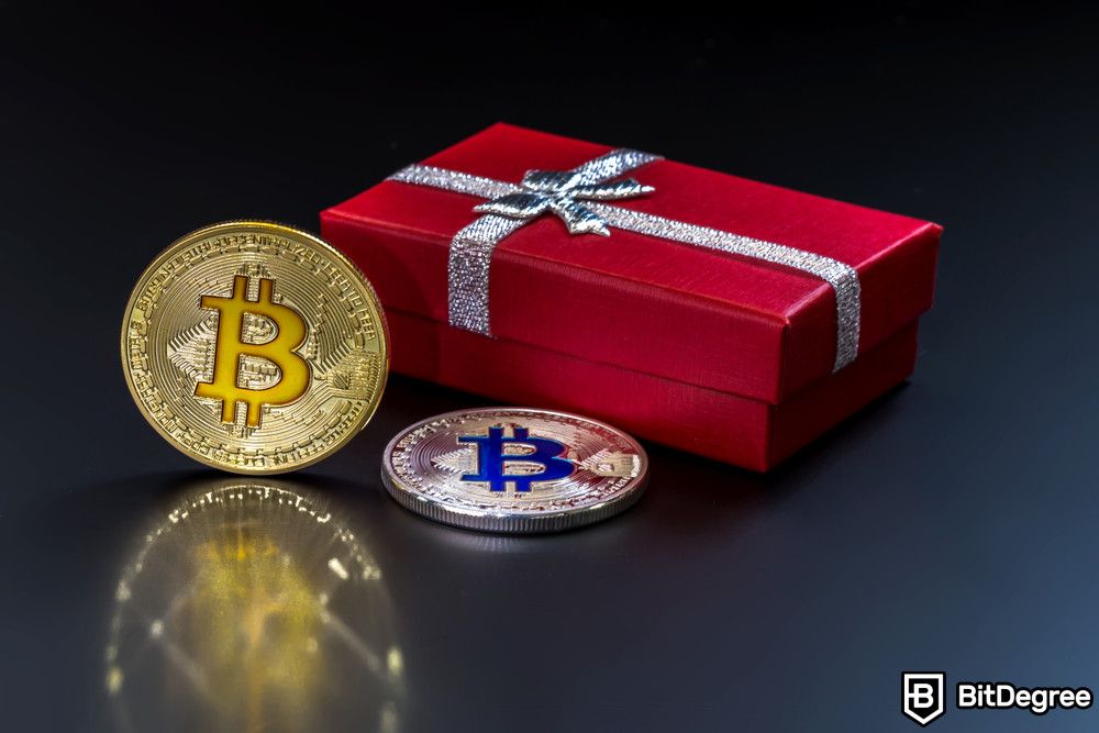 Bitcoin scams: two Bitcoins and a red present box.