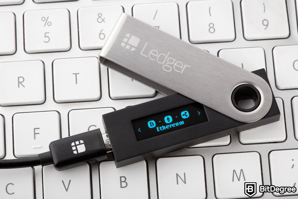 Bitcoin scams: Ledger wallet with Ethereum coin selection on display.