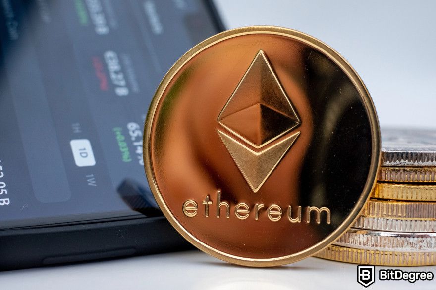 Bitcoin staking: Ethereum coin in front of a mobile phone.