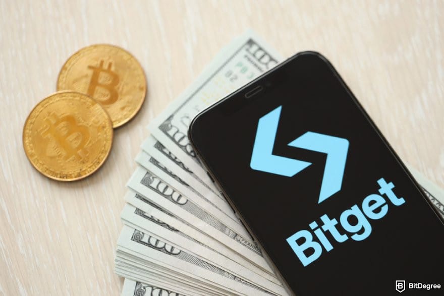 Bitget Canada: a phone displaying Bitget's logo, a stack of $100 bills, and two BTC coins. Bitget Canada: a phone displaying Bitget's logo, a stack of $100 bills, and two BTC coins.