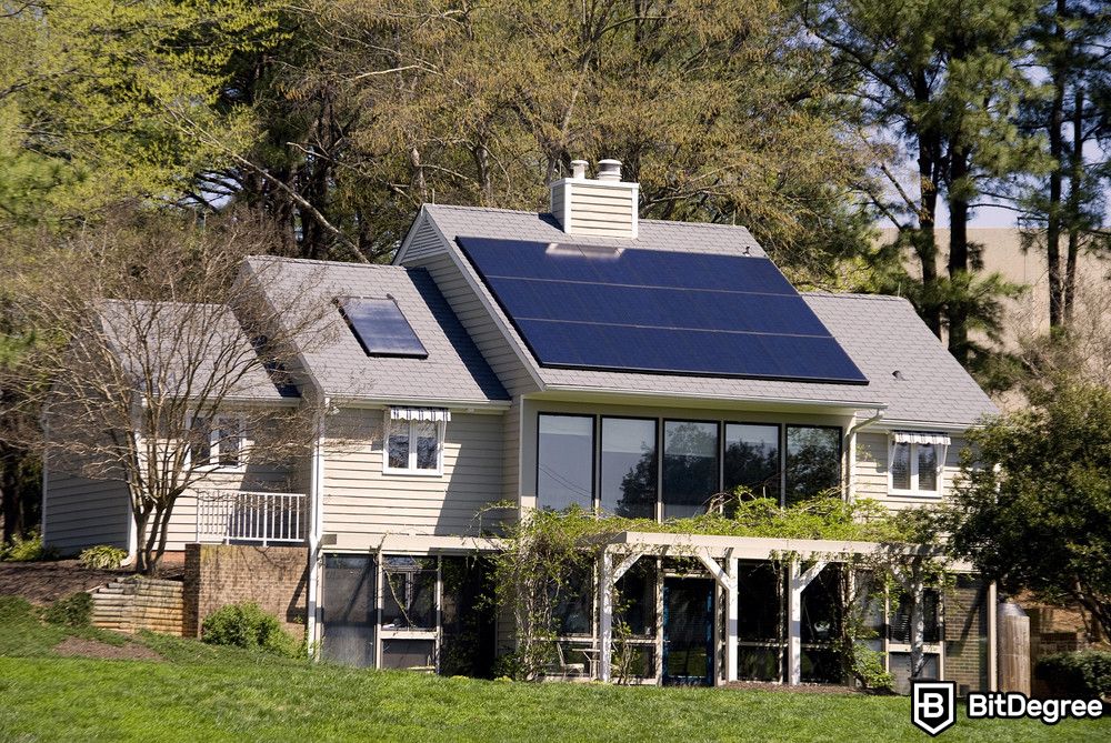 Blockchain for energy: solar panels installed on a house.