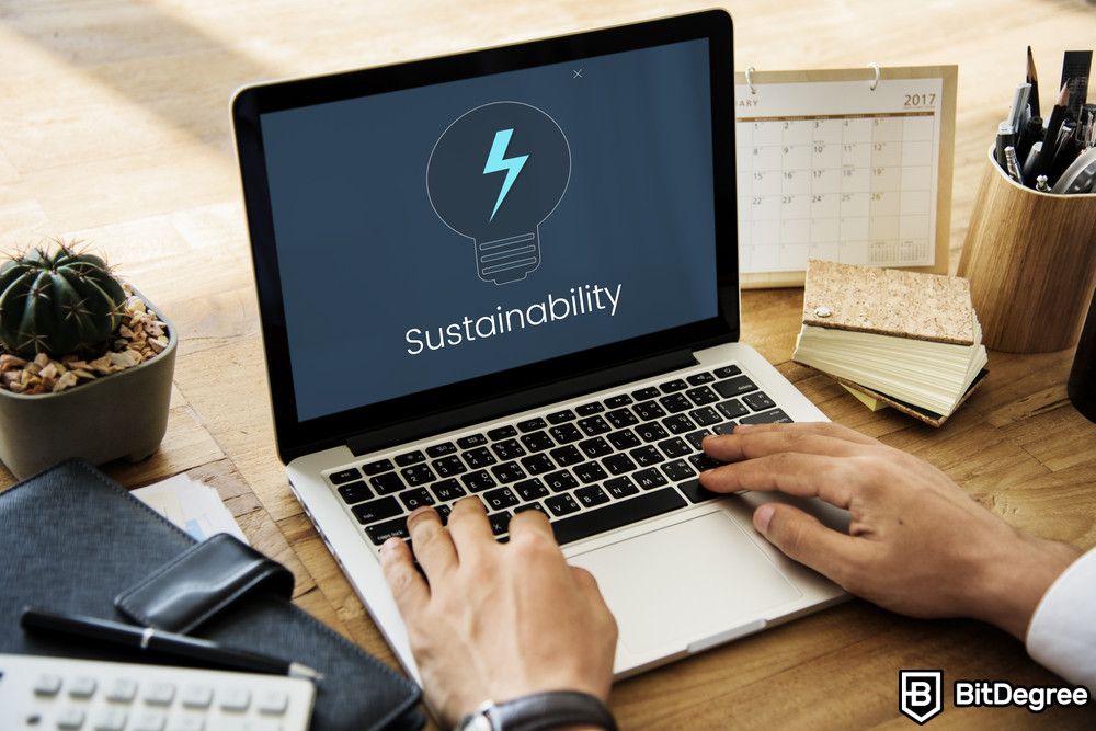 Blockchain for energy: a laptop showing a background with a text Sustainability.