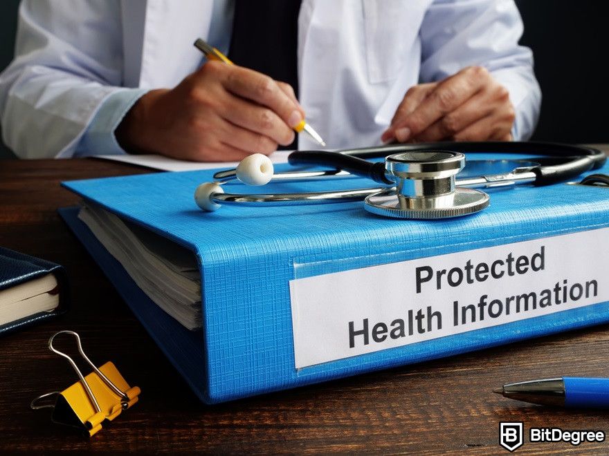 Blockchain in healthcare: Folder with protected health information PHI as part of HIPAA rules.
