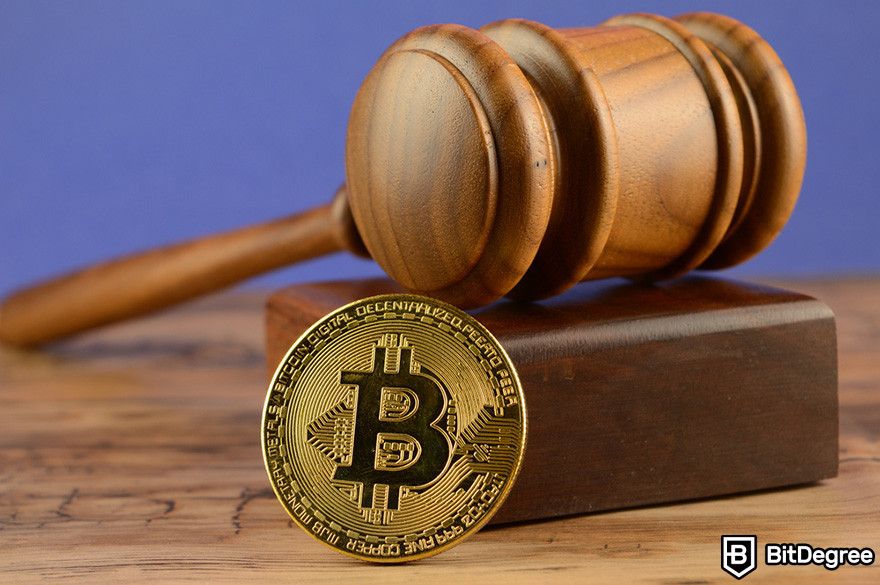 Blockchain in insurance: a Bitcoin token and a gavel.