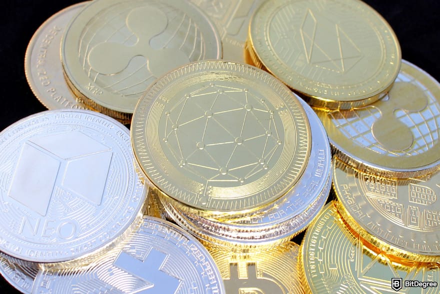 BuyUcoin review: stacks of physical crypto coins.