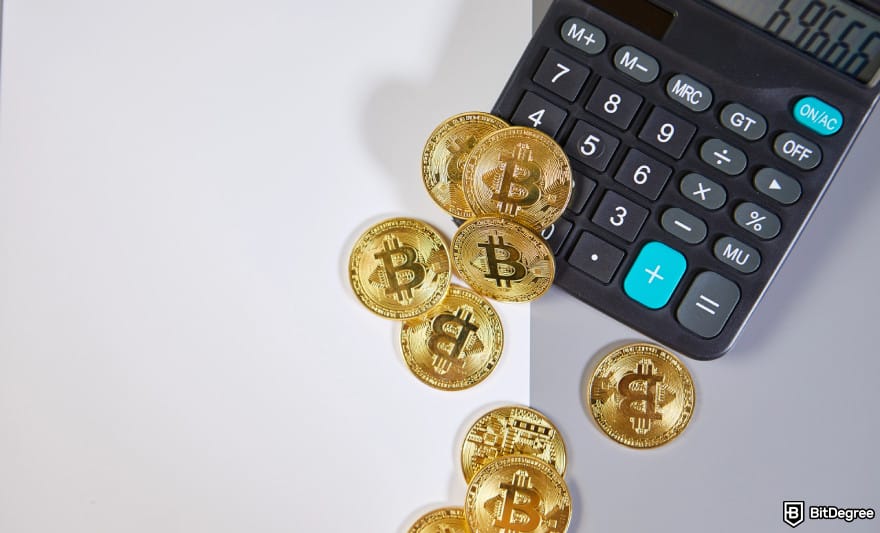 Bybit margin trading: crypto coins over a calculator to illustrate margin calculation.
