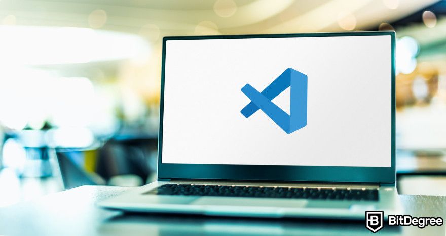 Can ChatGPT create a website: Visual Studio Code logo displayed on a laptop.