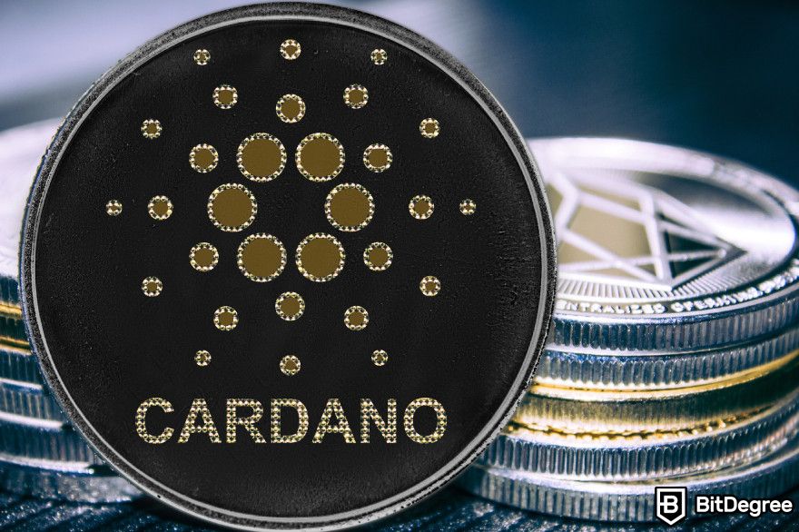 Cardano staking: Cardano physical token in front of a collection of coins.