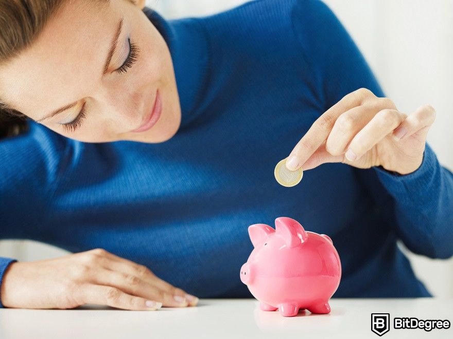 Chainlink staking: a woman drops a coin into a piggy bank.