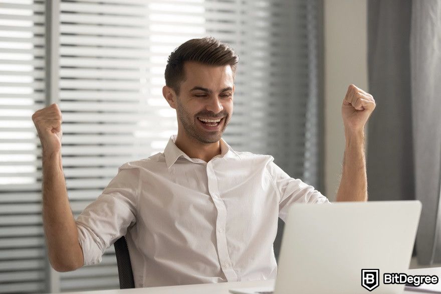 Chainlink staking: a man looks happy for receiving good news.