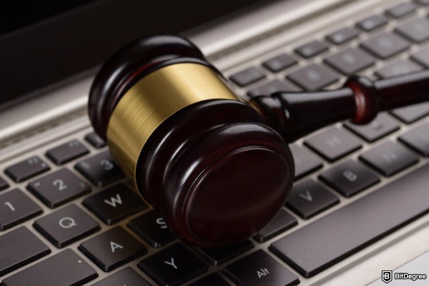 Cluely AI review: a gavel on a laptop keyboard.