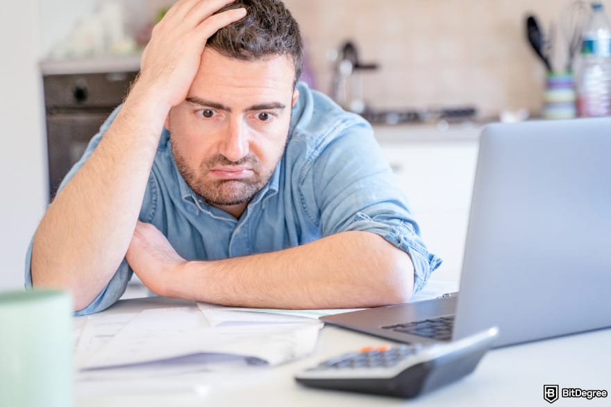 Coinbase taxes: a person stressed out, worried about tax.