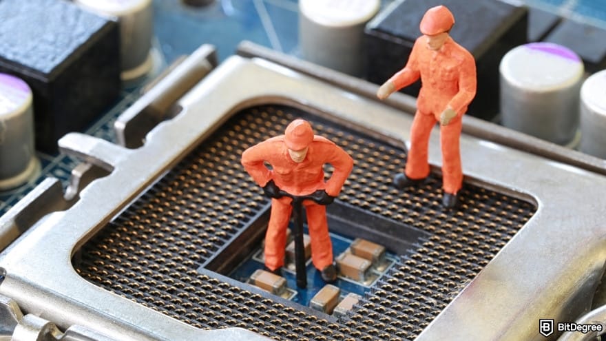 Coinbase taxes: toy miners are digging for ore on computer.