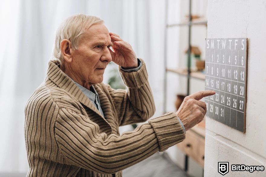 Crypto bear market: old man looking confused at a calendar.