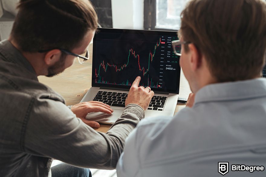 Crypto options trading: traders discussing a price chart.