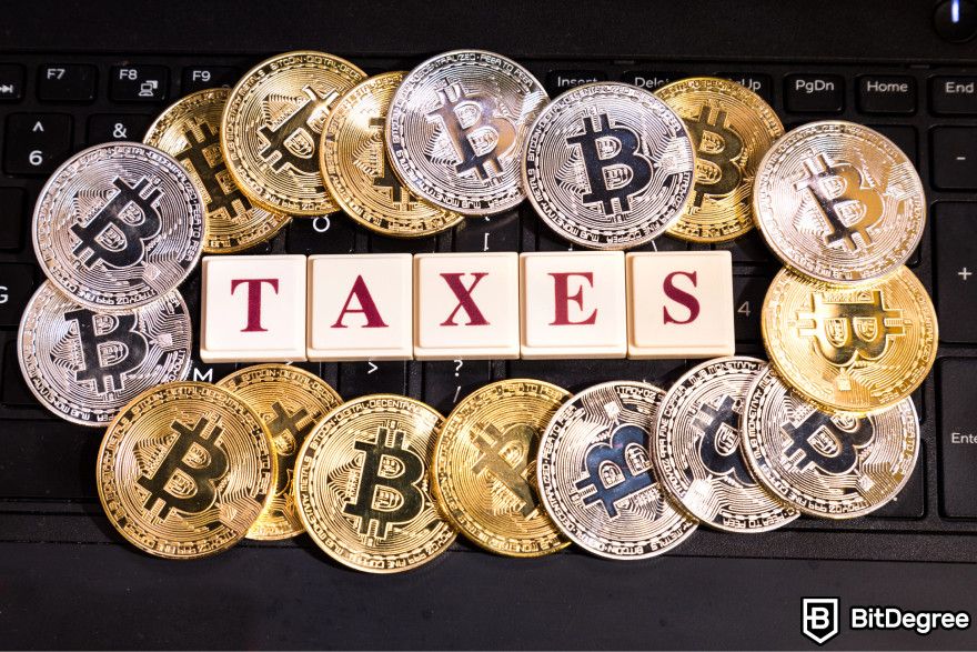 Crypto tax-loss harvesting: vertically arranged wooden blocks forming the word "taxes".