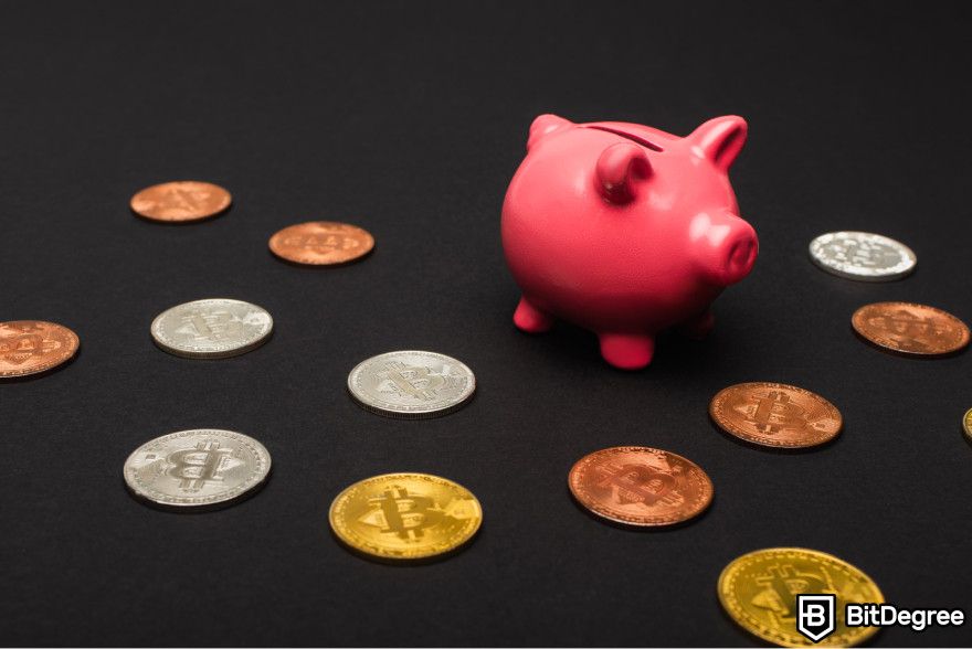 Crypto tax-loss harvesting: a piggy bank with Bitcoins scattered around it.