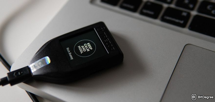 Crypto wallet security: a Trezor wallet on a MacBook.