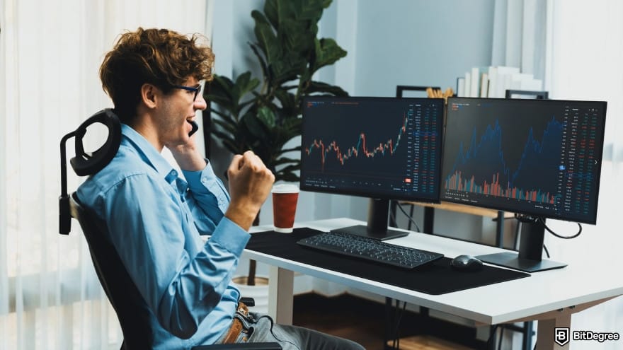Crypto.com Level Up review: young trader calling on smartphone.