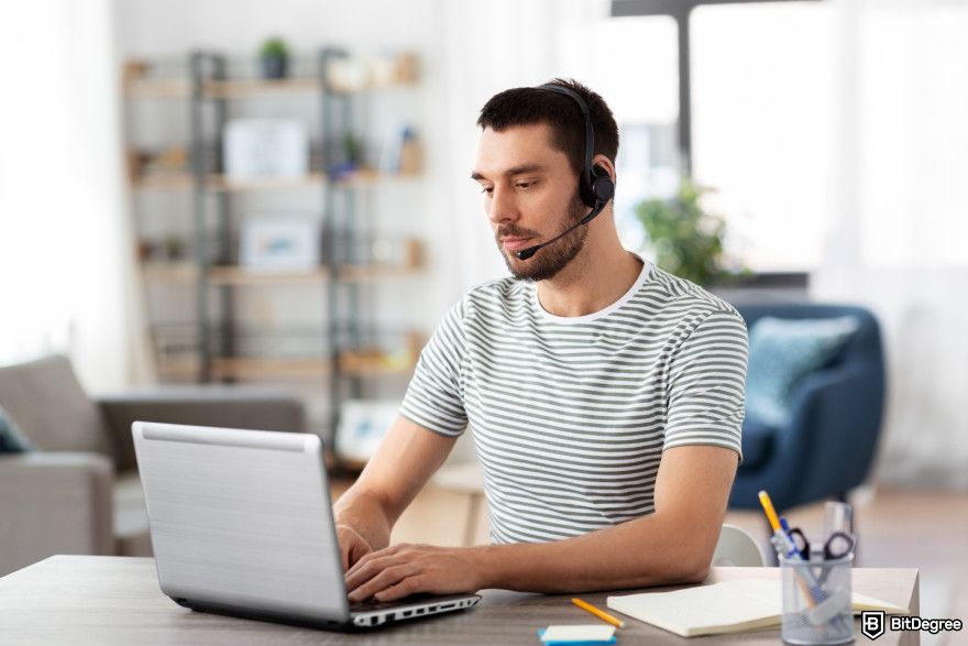 Cryptocurrency jobs: a customer service specialist working from home.