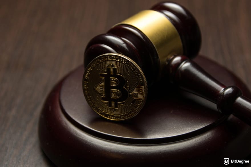 Cryptocurrency regulation SEC: judge's gavel and Bitcoin.