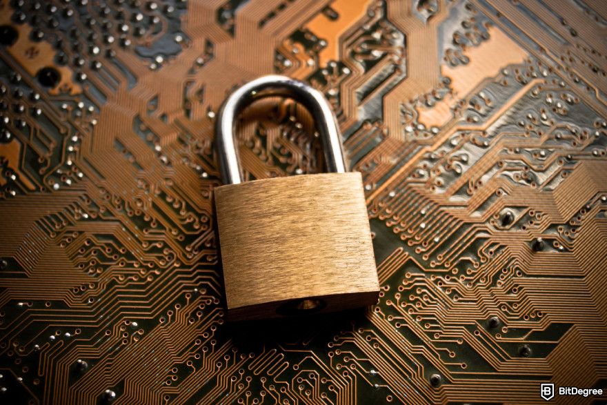 Cryptocurrency jobs: a padlock placed on a circuit board, symbolizing security.