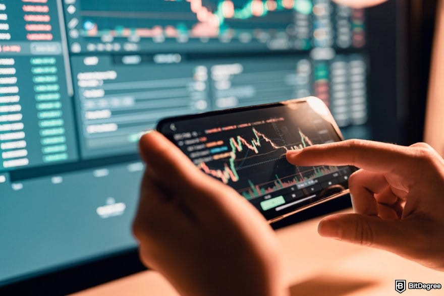 CryptoWatch review: a person checking price chart on desktop and mobile devices.
