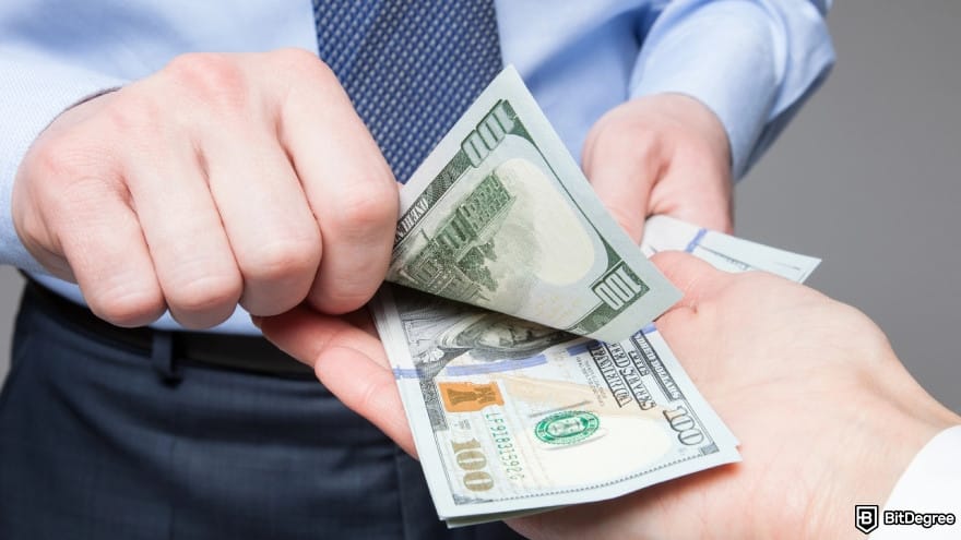 Currency devaluation in Nigeria: hands exchanging money.