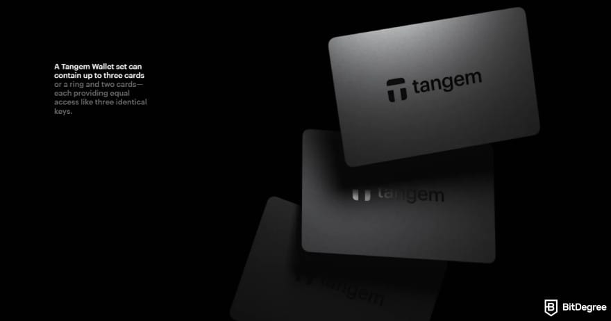 Dash wallet: three Tangem hardware wallet cards stacked on a dark background.