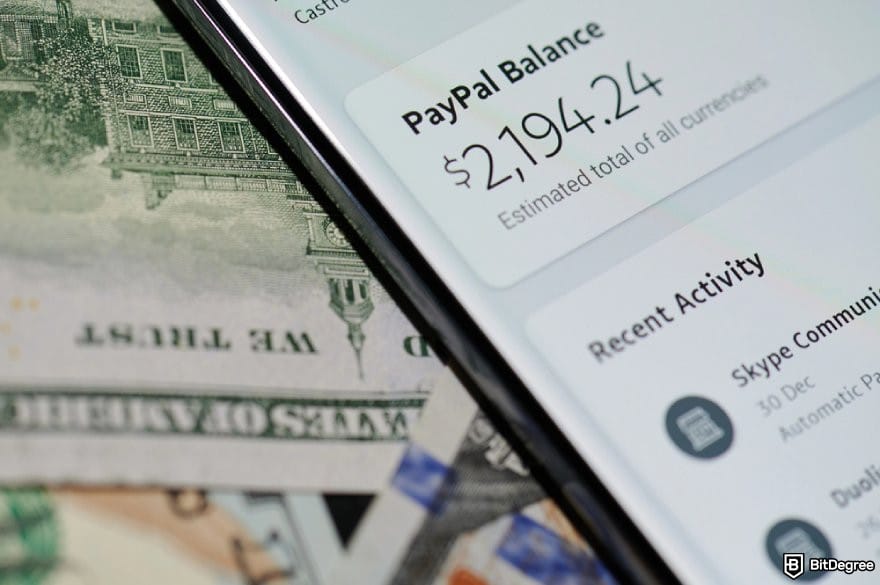 Does PayPal work in Nigeria: a phone showing the PayPal balance.