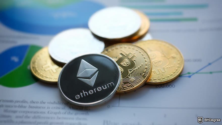 Ethereum cloud mining: Ethereum and Bitcoin coins on top of a paper.