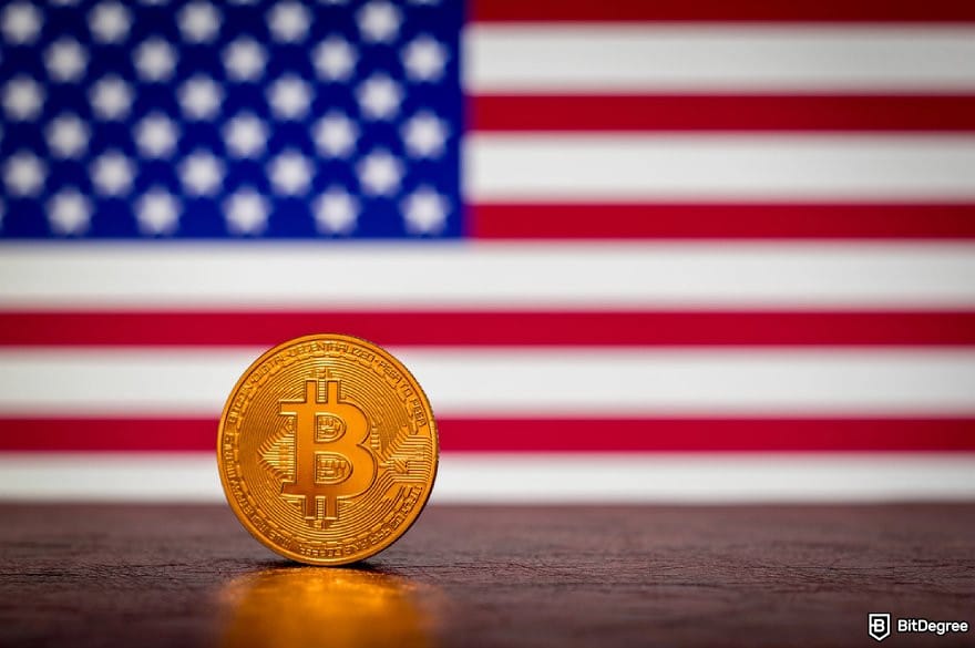 eToro review: a BTC coin in front of the US flag.
