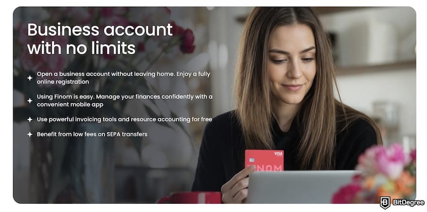 Finom review: a woman looking at her laptop and holding a Finom card, with text about Finom features.