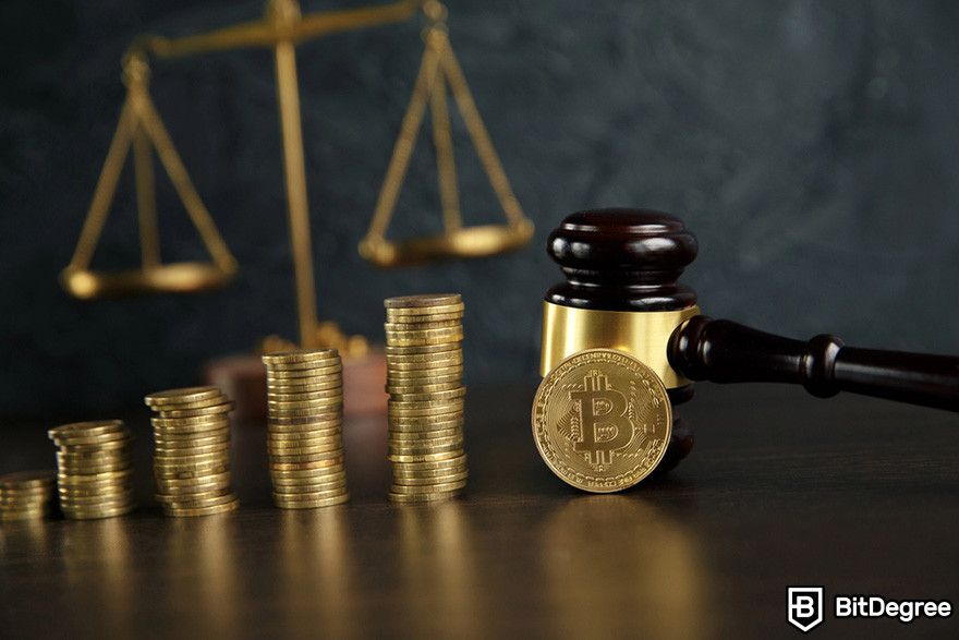 Hardware token: stacks of Bitcoin token and a judge gavel.