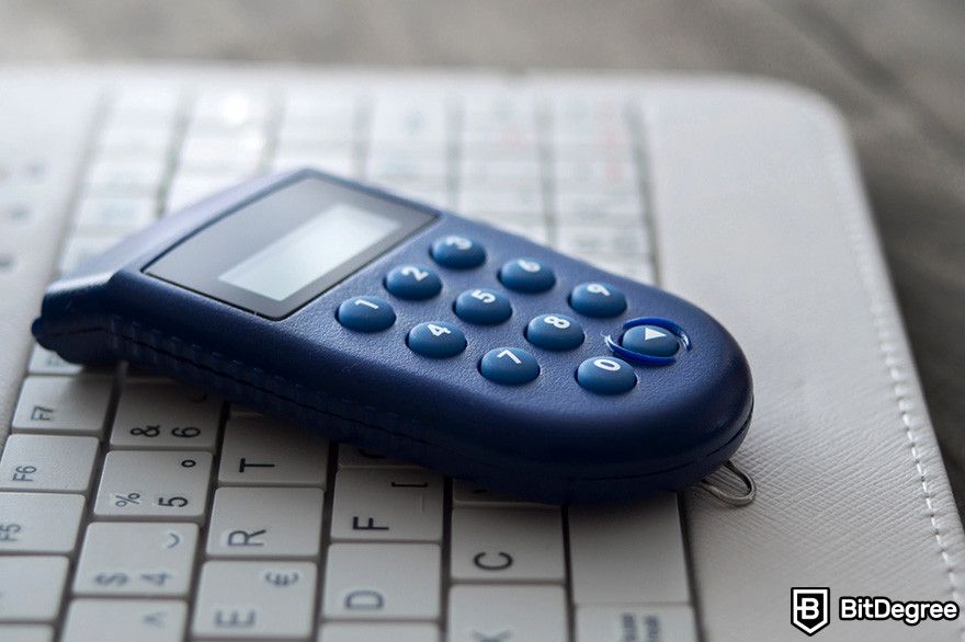 Hardware token: an e-banking one time password token on top of a laptop keyboard.