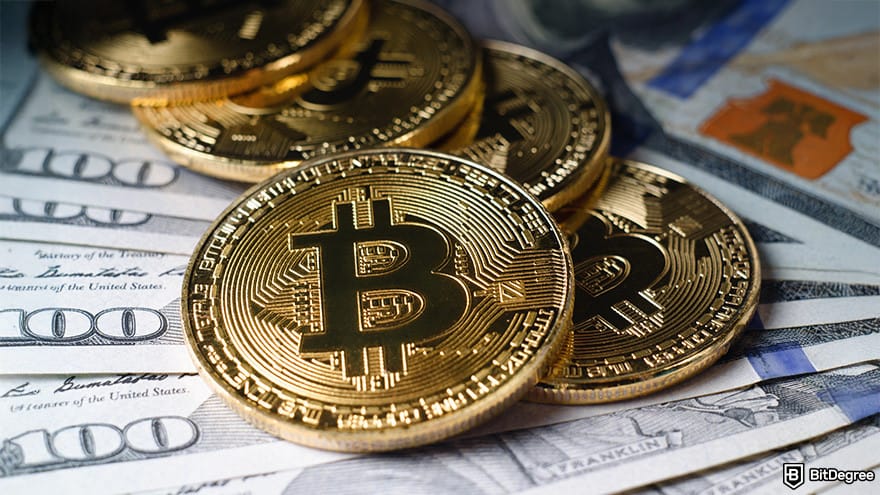Highest paying Bitcoin faucet: Bitcoin placed on a stack of cash.