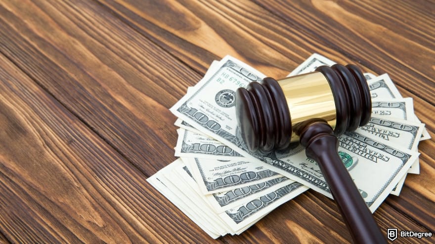 How to add money to Revolut: a gavel and money on brown wooden table.