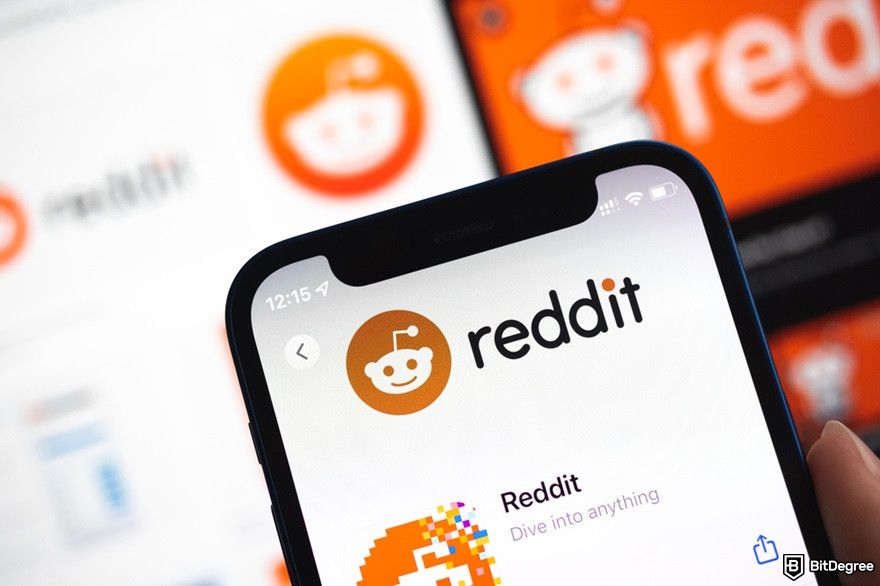 How to build ai crypto trading bot: Reddit logo displayed on a smartphone device.