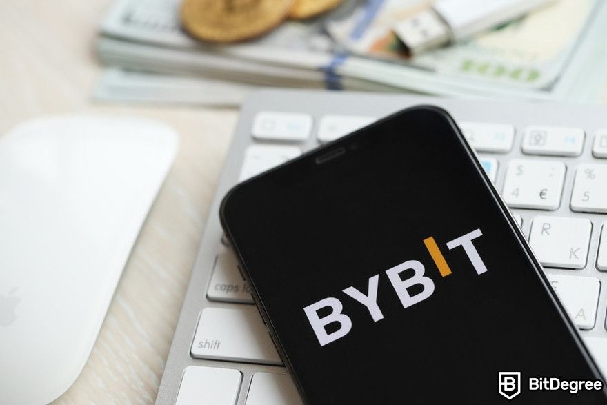 How to buy meme coins: Bybit logo on an iPhone display screen.